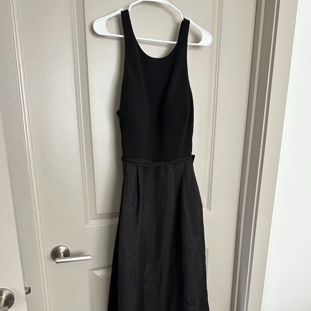 JS Collections, Black full skirt gown with cut out back